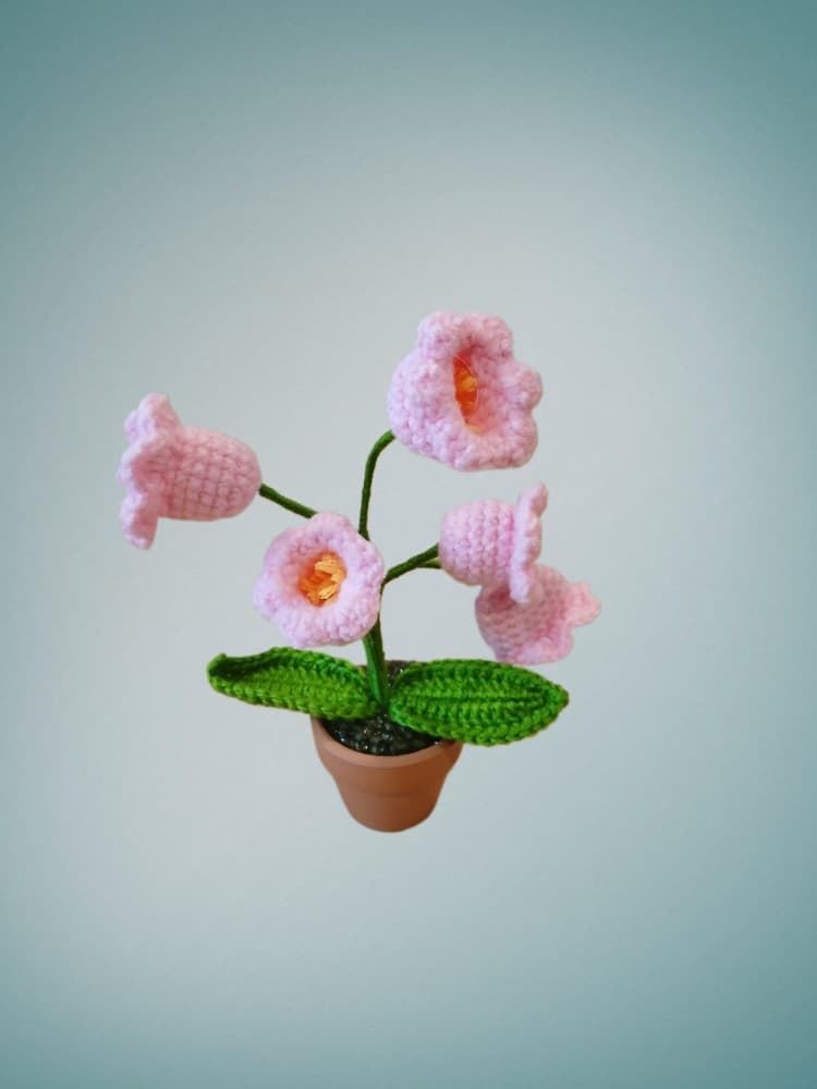 Planta con tarro barro 5 flores rosas hecha a mano a ganchillo (amigurumi). - Imagen 1